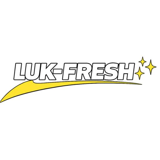 LUK-FRESH logo featuring bold white uppercase lettering with a black outline, a gold swoosh underneath, and three gold sparkle stars on a transparent background.